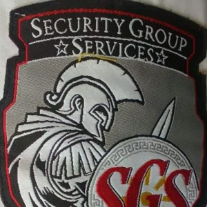 Амблемот што го носат обезбедувачите на СГС